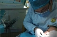 市口腔医院为福利院儿童免费口腔治疗
